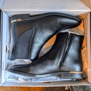 Nine West "Aribel 3"  Black ankle boot with gold trim